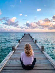 Woman Sit Boardwalk Jetty Pier  - Renan_Brun / Pixabay